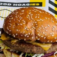 Tg Impossible Burger · Impossible Meatless Burger, yellow american cheese, signature Boom Boom sauce, caramelized o...