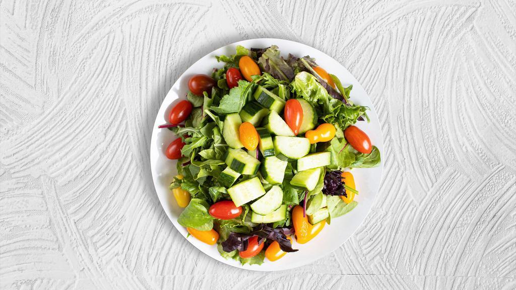 Classic Garden Salad · Fresh lettuce, tomatoes, green pepper, cucumber, banana peppers, olives. Served with bread and your choice of dressing.
