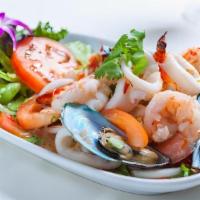 Seafood Salad  · Made with shrimp crab legs pollock celery and tossed in a mayo base.