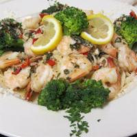 Shrimp Scampi (8 Pieces) · Sauteed jumbo shrimp in our white scampi sauce over capellini.