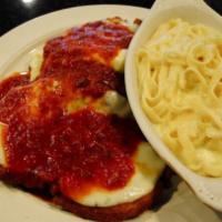 Chicken Parmigiana · Our pride meal Fresh chicken breast cutlet breaded and topped with melted provolone cheese a...