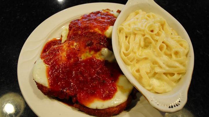 Chicken Parmigiana · Our pride meal Fresh chicken breast cutlet breaded and topped with melted provolone cheese and our homemade tomato sauce.