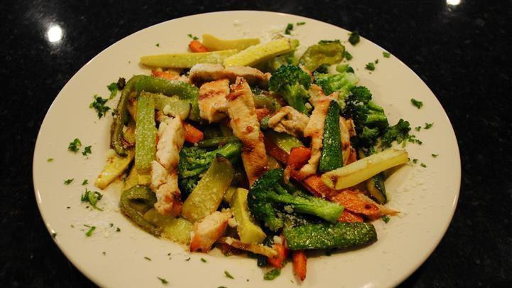 Healthy Chicken · Sauteed fresh vegetables in olive oil and garlic, topped with grated cheese and one side.