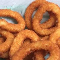 Onion Rings (12Pcs)  · Crispy battered coated onions sliced deep-fried until golden perfection.