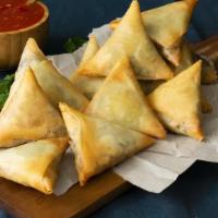 Veggie Samosa (3 Pieces) · Vegetarian. Fritter filled with seasoned potatoes and peas.