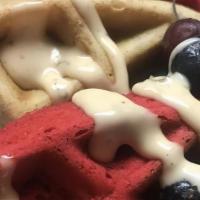 Side Of Waffles · Topped with mixed berries, caramel glaze, and powdered sugar. Choose between Red Velvet waff...