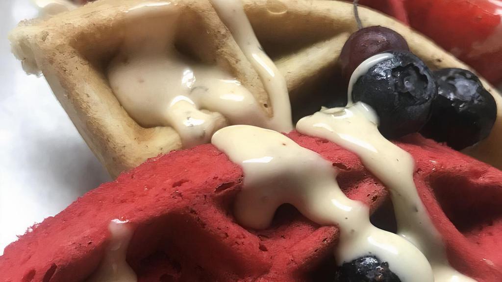 Side Of Waffles · Topped with mixed berries, caramel glaze, and powdered sugar. Choose between Red Velvet waffle, French Toast waffles, or Half & Half