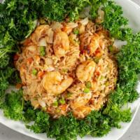 Fried Rice W/Shrimp · Fried rice lightly seasoned with peas, carrots, bean sprouts, eggs, onion and scallions with...