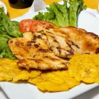Pechuga De Pollo A La Parilla (Arroz, Tostones, Frijoles Y Ensalada) · Grilled chicken breast served with rice, fried plantains, red beans and salad.