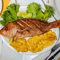 Mojarra Frita Con Arroz, Tostones Y Ensalada · Whole Fried Red Snapper served with rice, fried plantains, and salad