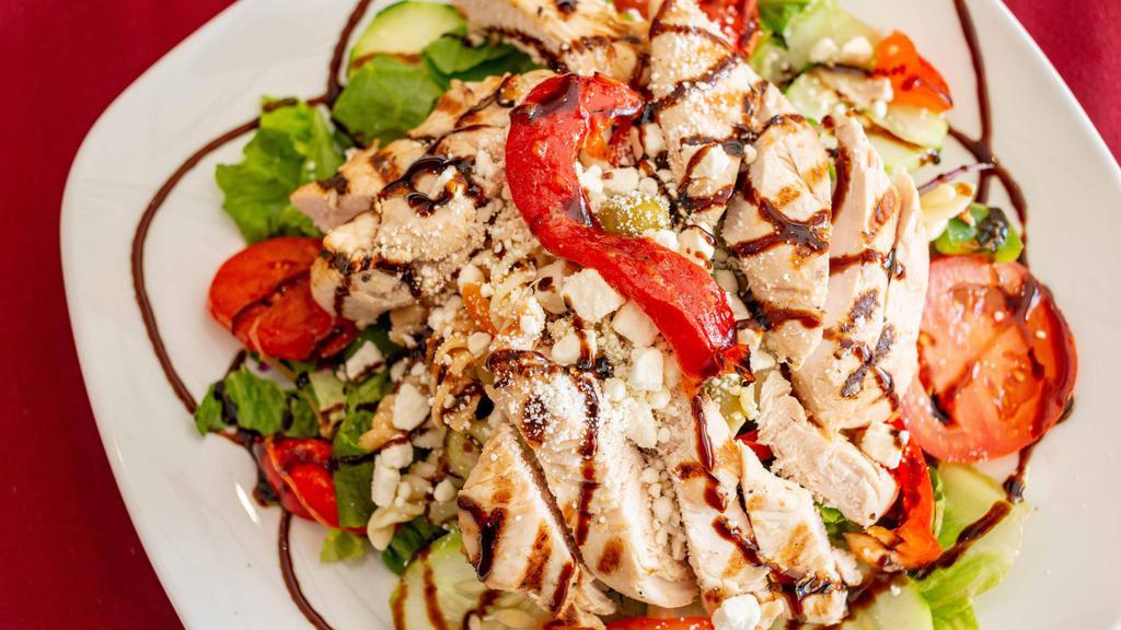 Cafe Salad · Mixed greens, tomato, cucumber, red onion, pasta salad & feta cheese topped with choice of grilled chicken or tuna salad finished with balsamic glaze.
