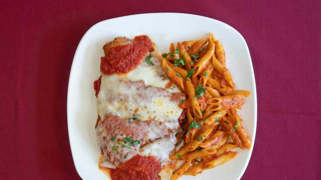 Chicken Parmigiana
 · Fried chicken breast strips with sauce, Romano cheese and mozzarella.