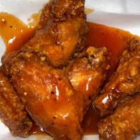 Wings · Choice of: plain, buffalo (mild, medium, hot), honey BBQ, teriyaki , Cajun, lemon pepper, ho...