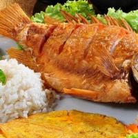 Pargo Frito · Fried red snapper served with two sides