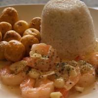 Camarones Al Ajillo · Shrimp in a garlic sauce served with two sides