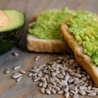 Green Toast · Sourdough bread, avocado, olive oil, and salt.