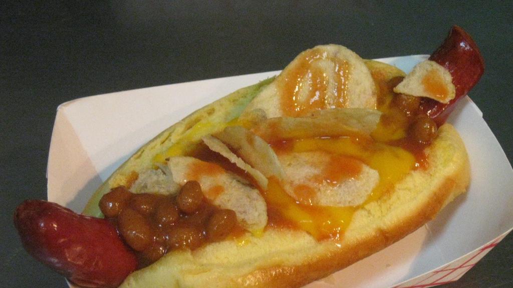 Trailer Park Dog · Baked beans, cheese sauce, hot sauce, BBQ potato chips.