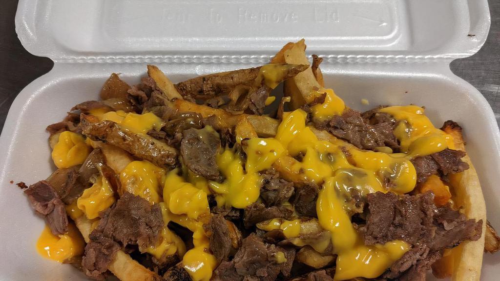 Cheesesteak Fry Bowl · Thinly-sliced steak, cheese sauce, grilled onions.