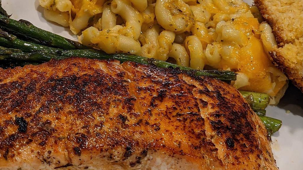 Honey Butter Salmon · Perfectly pan seared and seasoned salmon with two sides to compliment the taste