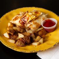 Breakfast Wrap · Two scrambled eggs, cheddar cheese, your choice of meat (chicken, bacon, sausage, or turkey ...