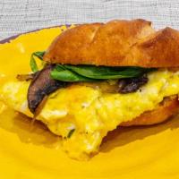Veggie Breakfast Sandwich  · Two scrambled eggs, spinach, mushrooms, onions, and cheddar cheese, served on ciabatta roll
