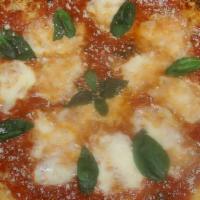 Margherita Pizza · Vegan. House red sauce, fresh mozzarella, extra virgin olive oil and basil.