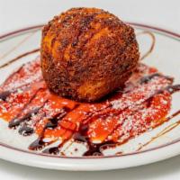 Arancini · Homemade risotto ball filled with ground beef, fontina cheese, and peas. Served with a side ...