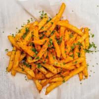 Truffle Fries · Vegan, gluten free. Thick cut fries topped with truffle oil, parmigiano and rosemary.