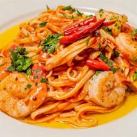 Fra Diavolo · Linguine sautéed with shrimp and calamari in a spicy red sauce, finished with house chili oil.