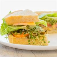 Dirk'S Spicy Veggie · Homemade hummus, swiss & cheddar cheese, jalapenos, red onions, romaine lettuce, sprouts (te...