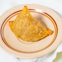 Sambusa · Samosa, a fried dough pastry stuffed with potatoes, peas, lentil and spices.