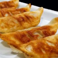 Pork Gyoza · Pan fried dumpling.