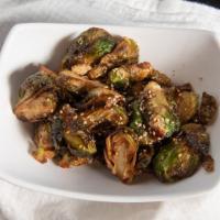 Crispy Brussels Sprouts · Deep-fried and tossed with a sweet tangy sesame sauce.