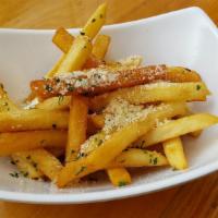 Truffle Parmesan Fries · Fries in truffle oil, tossed in parmesan cheese.