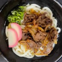 Beef Udon · Teriyaki sliced ribeye, onion, fish cake, and scallions in a fish based broth with udon nood...