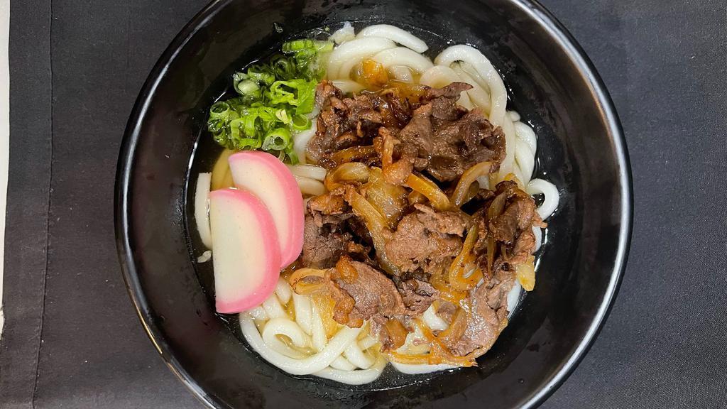 Beef Udon · Teriyaki sliced ribeye, onion, fish cake, and scallions in a fish based broth with udon noodles.