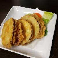 Sweet Potato Tempura · 5 pieces of Japanese sweet potato. Side of tempura sauce.