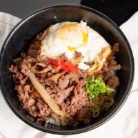   Gyudon · Thin sliced ribeye steak sautéed with onions over white rice. Upcharge for egg.
