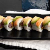 Eagles Roll · 8 pcs/roll - wasabi crusted tuna + mango roll, topped with shimp + avocado, drizzled with wa...