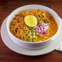 Khao Soi Lunch · Northern creamy curry-based soup served with egg noodles and ground chicken topped with cris...