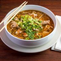 Tom Yum With Noodle Soup · Thai style tom yum with mild spicy broth served with rice noodles. Choice of chicken or shri...