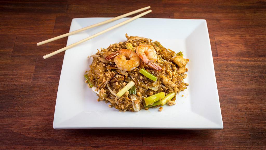 Pad Thai · Rice noodles in pad Thai sauce with chicken and shrimp, bean sprouts, scallions and egg topped with crushed peanuts.