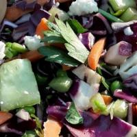 Salad - Entrée · Cauliflower, cucumber, red cabbage, celery, and peas.  Comes with sesame, garlic vinaigrette.