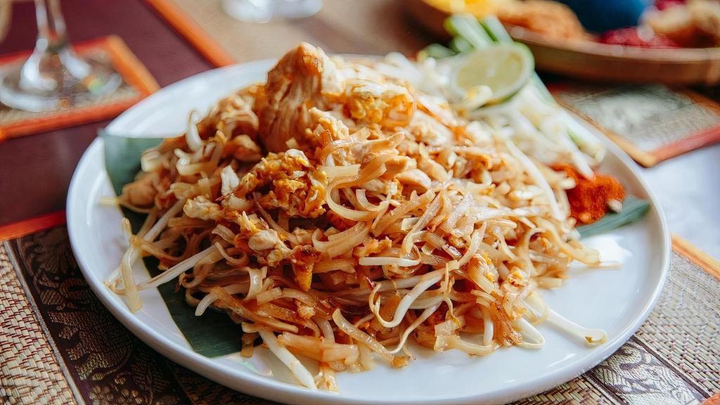 Pad Thai · (Regular or Spicy) Rice noodles stir-fried with chicken, egg, peanuts, bean sprouts, scallions