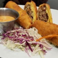 Bulgogi Eggrolls · Hand rolled and filled with Korean marinated ribeye meat, bell peppers. And onions, served w...