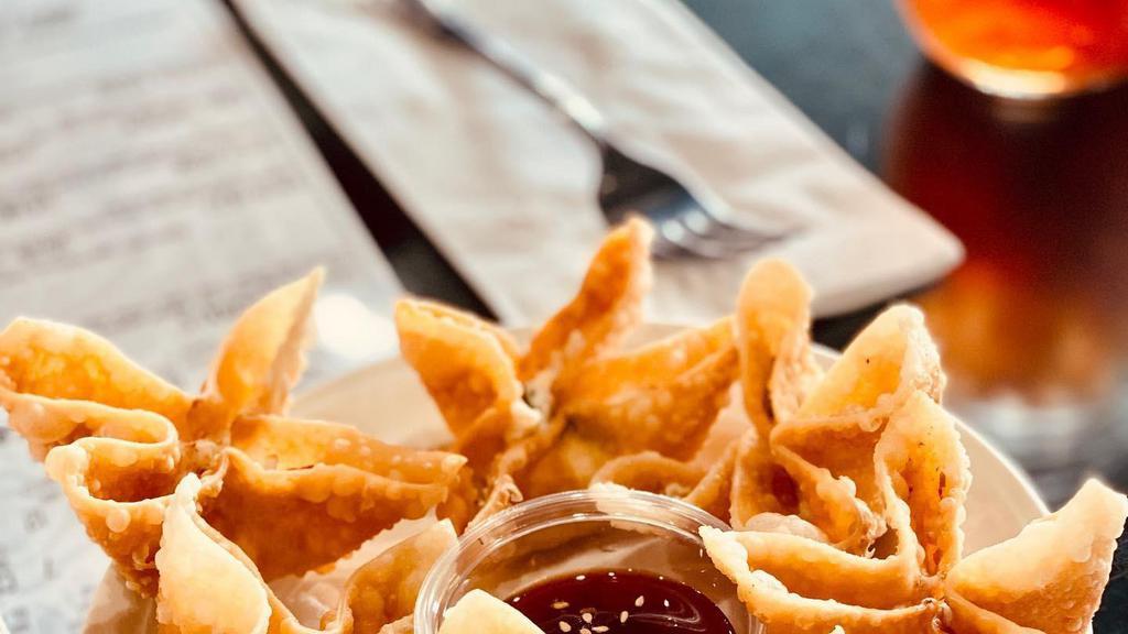 Crab Rangoons (6) · Wontons stuffed with crab. Cream cheese and chopped green onions. Served with our sweet chili sauce.