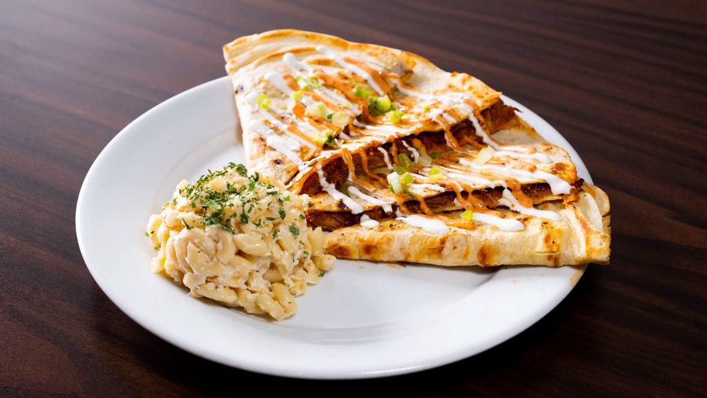 Quesadillas · Our cheddar and mozzarella cheese mix with your choice of meat, served in a grilled flour tortilla.
