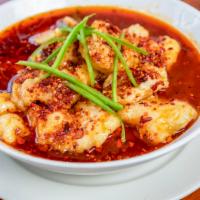 Boiled Fish With Vegetables (水煮鱼) · Hot and spicy.