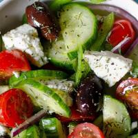 Greek Salad · Garden Salad Topped with Feta Cheese, Black Olives.