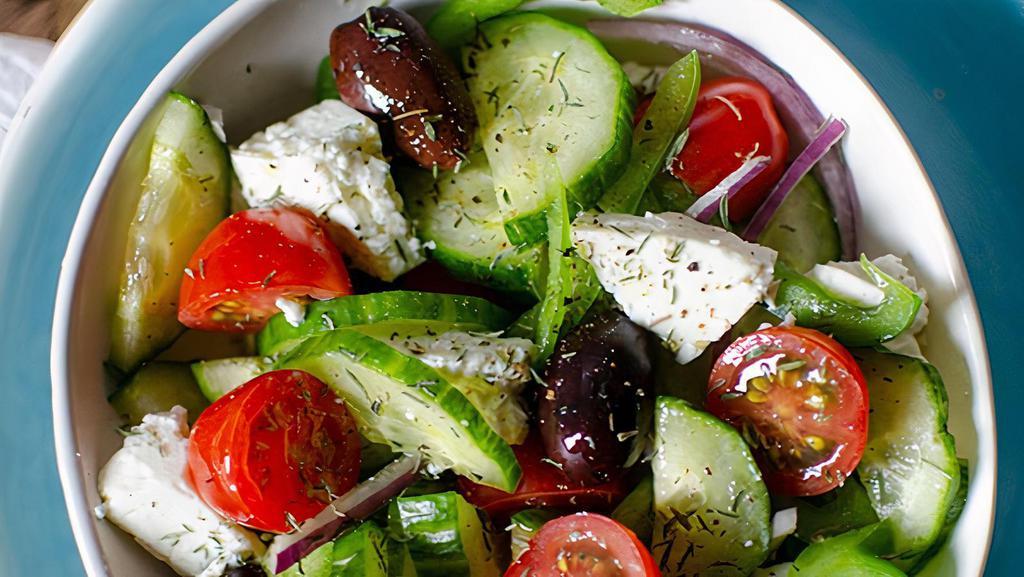 Greek Salad · Garden Salad Topped with Feta Cheese, Black Olives.